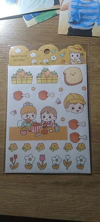 Hand-held sticker