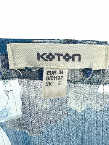 34 Beden çeşitli Renk Koton Gömlek %70 İndirimli.