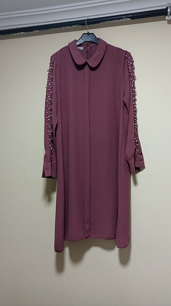 Pembe tunik