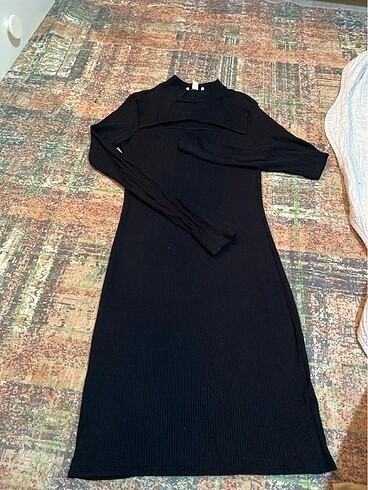 Siyah kışlık göğüs dekolteli elbise