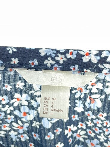 34 Beden çeşitli Renk H&M Midi Etek %70 İndirimli.