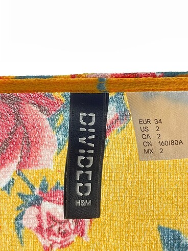34 Beden sarı Renk H&M Bluz %70 İndirimli.