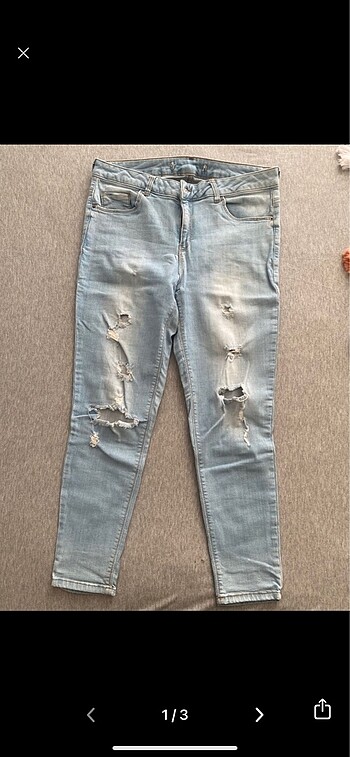 Yırtık paça kot jean