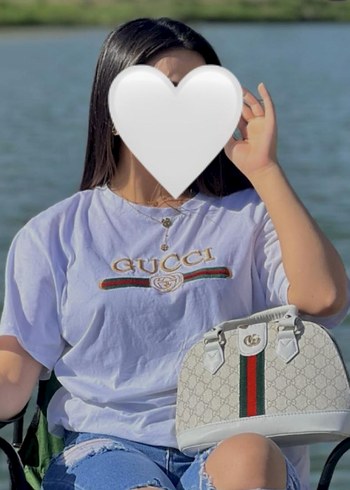 Gucci canta