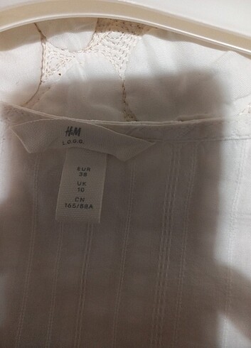 38 Beden beyaz Renk H.M L.O.G.G marka bayan gömlek 