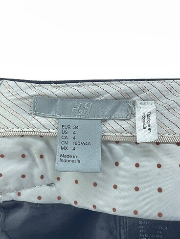 34 Beden siyah Renk H&M Mini Etek %70 İndirimli.