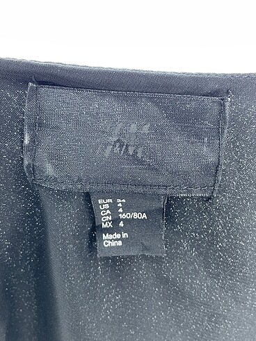 34 Beden siyah Renk H&M Kısa Elbise %70 İndirimli.
