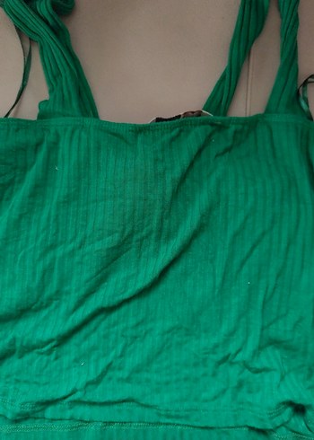 Yeşil Piliseli Kadın Atlet - Görsel 3