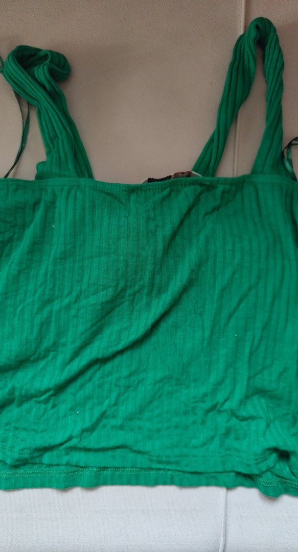 Yeşil Piliseli Kadın Atlet - Görsel 3