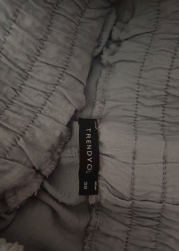 Gri Piliseli Rahat Kesim Kadın Kumaş Pantolon Trendyol - Görsel 2