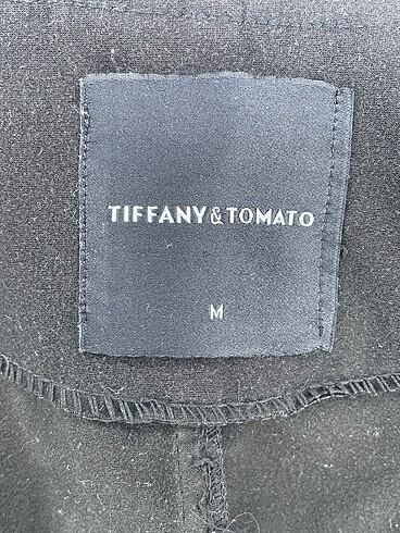 m Beden siyah Renk Tiffany Tomato Yağmurluk %70 İndirimli.