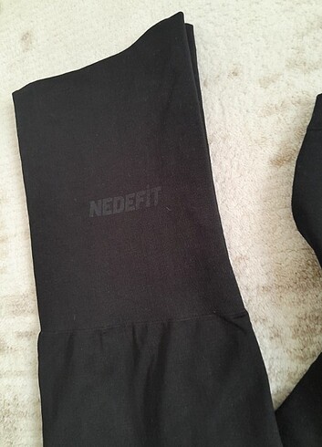 NEDEFİT İNCELTEN TAYT