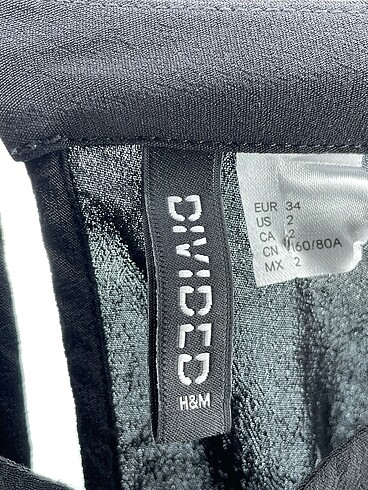 34 Beden siyah Renk H&M Bluz %70 İndirimli.