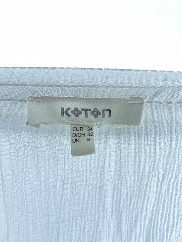 34 Beden beyaz Renk Koton Bluz %70 İndirimli.