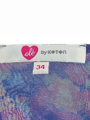 34 Beden çeşitli Renk Koton Mini Etek %70 İndirimli.