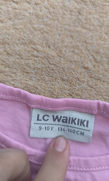 LC Waikiki Pembe ponili sıfır kollu t-shirt