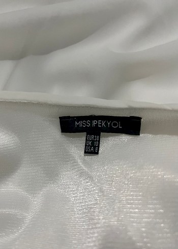 ipekyol Fırfırlı V Yaka Kolsuz Beyaz Keten Bluz