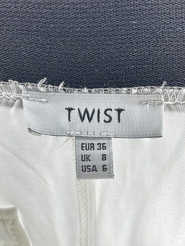 36 Beden beyaz Renk Twist Düz Kesim %70 İndirimli.