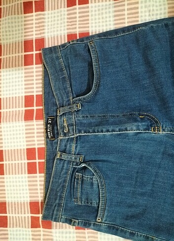Urban Outfitters İspanyol paça koyu renk kot pantolon