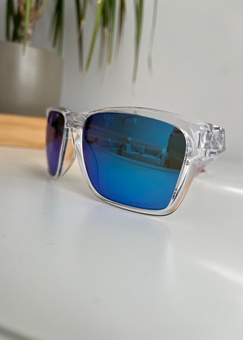 Beden Oakley Sylas Şeffaf Çerçeveli Mavi Güneş Gözlüğü