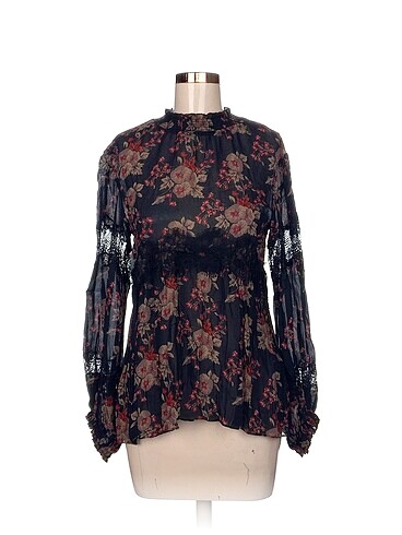 Zara Bluz %70 İndirimli.