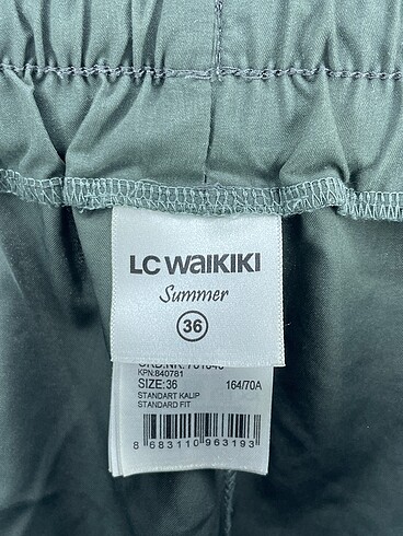 36 Beden haki Renk LC Waikiki Mini Şort %70 İndirimli.