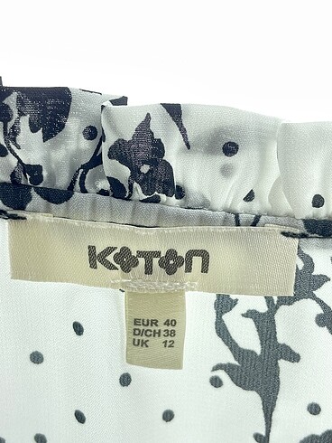 40 Beden beyaz Renk Koton Bluz %70 İndirimli.