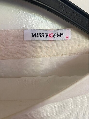 Miss Poem Miss poem etek yazlık beyaz diz üstü boy arkasında minik bir sök