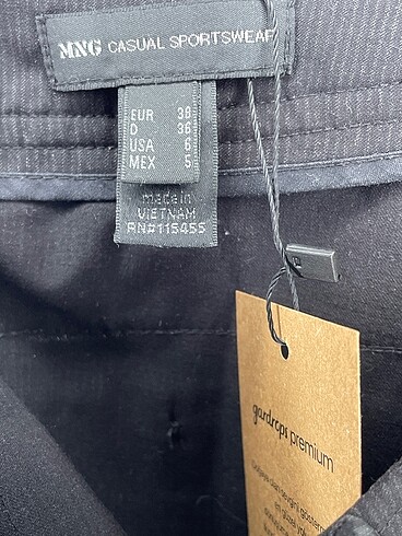 38 Beden siyah Renk Mango Kumaş Pantolon %70 İndirimli.