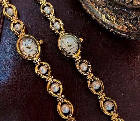 İncili Vintage model çelik kol saati