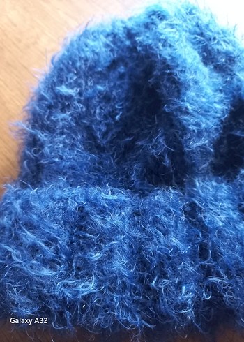 Kadın Mavi Örgü Yün Bere
RESSAM BERE - Görsel 4