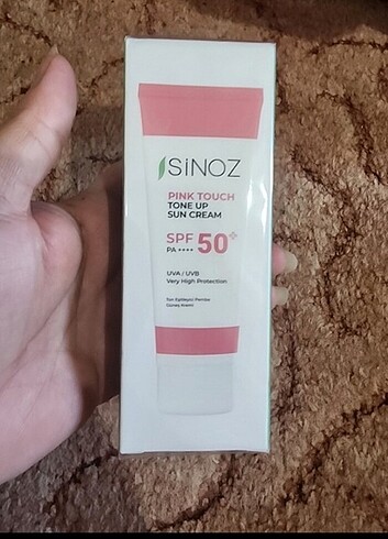 Sinoz 50 faktör Pink güneş kremi 