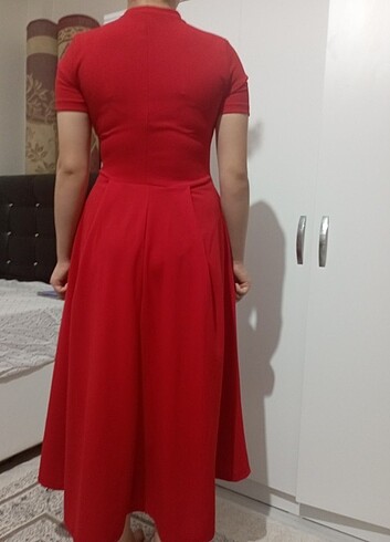 Elbise yeni hiç yırtığı yoktur cepleride vardır boyum 162