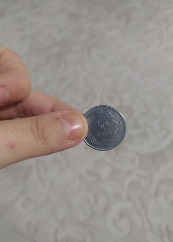 Gri Minimalist Eski Dönem Parası - Görsel 4