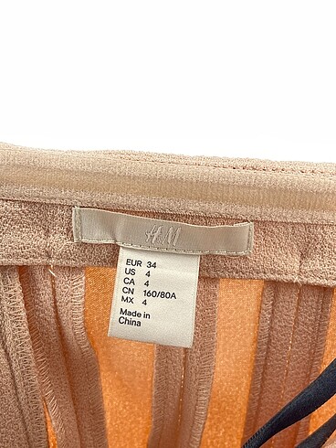 34 Beden çeşitli Renk H&M Kısa Elbise %70 İndirimli.