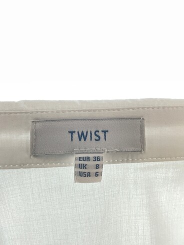 36 Beden beyaz Renk Twist Gömlek %70 İndirimli.