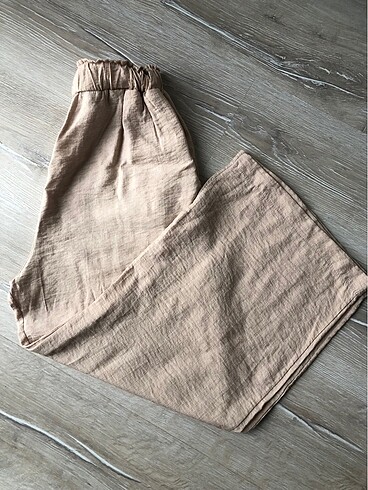 Kadın krem rengi bol paça ince kumaş yazlık pantolon