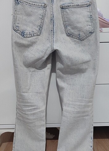 32 Beden Yırtmaçlı yırtık paça flare jean