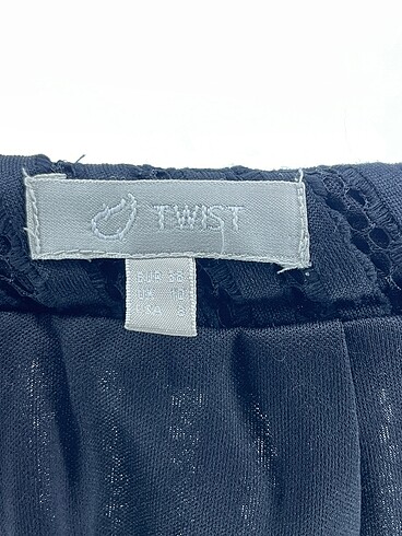 38 Beden siyah Renk Twist Midi Etek %70 İndirimli.