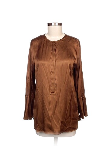 Zara Bluz %70 İndirimli.