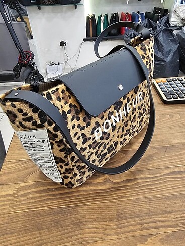 Bonheur leopar clutch bag