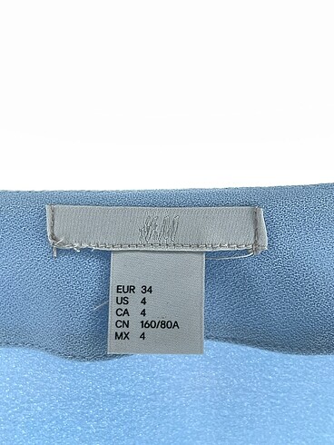 34 Beden mavi Renk H&M Bluz %70 İndirimli.