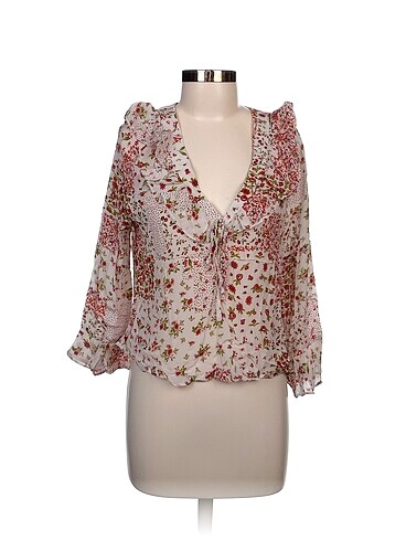 Zara Bluz %70 İndirimli.