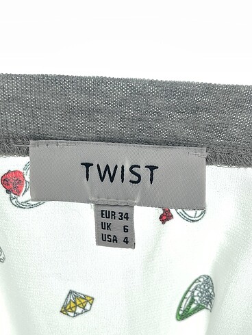 34 Beden beyaz Renk Twist Bluz %70 İndirimli.