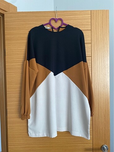 Asimetrik tunik