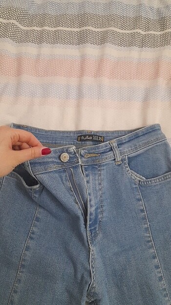 Açık mavi yırtmaç detaylı jean - Görsel 5