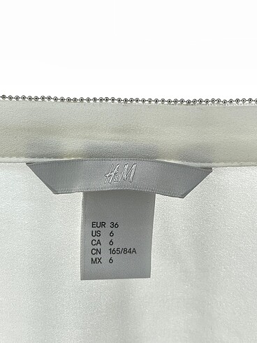 36 Beden beyaz Renk H&M Bluz %70 İndirimli.
