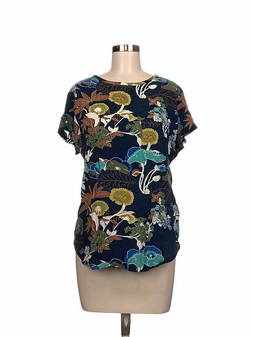 H&M Bluz %70 İndirimli.