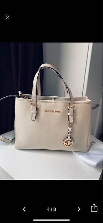 Beden Yepyeni Michael Kors krem renk çanta