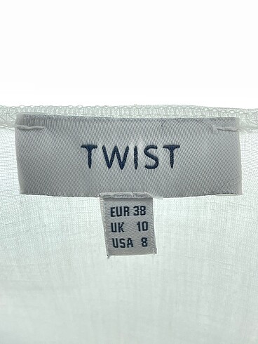 38 Beden beyaz Renk Twist Bluz %70 İndirimli.